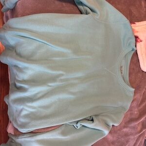 Teal sweatshirt with thumb holes